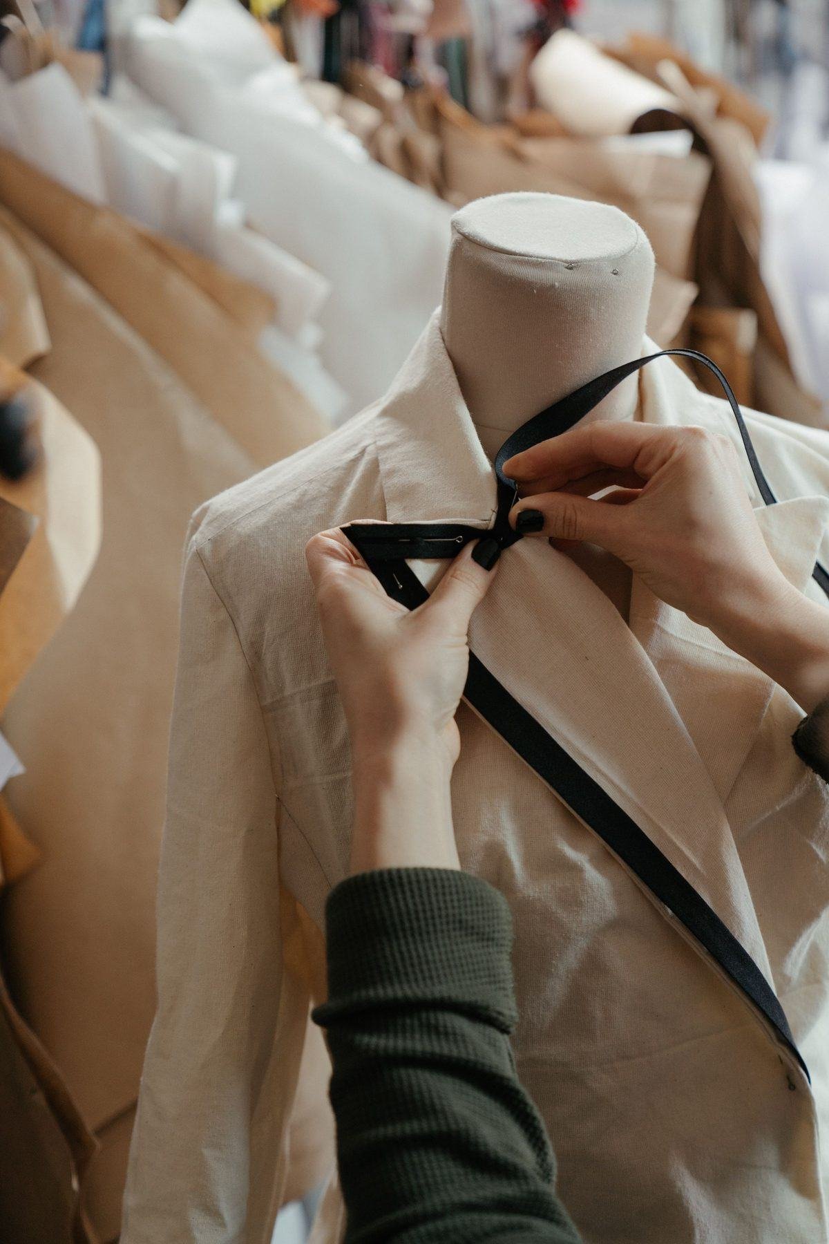 Tailor preparing fabric for a precise fit