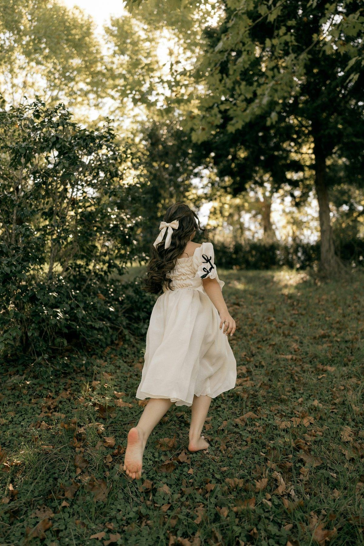 White dress worn in a garden setting
