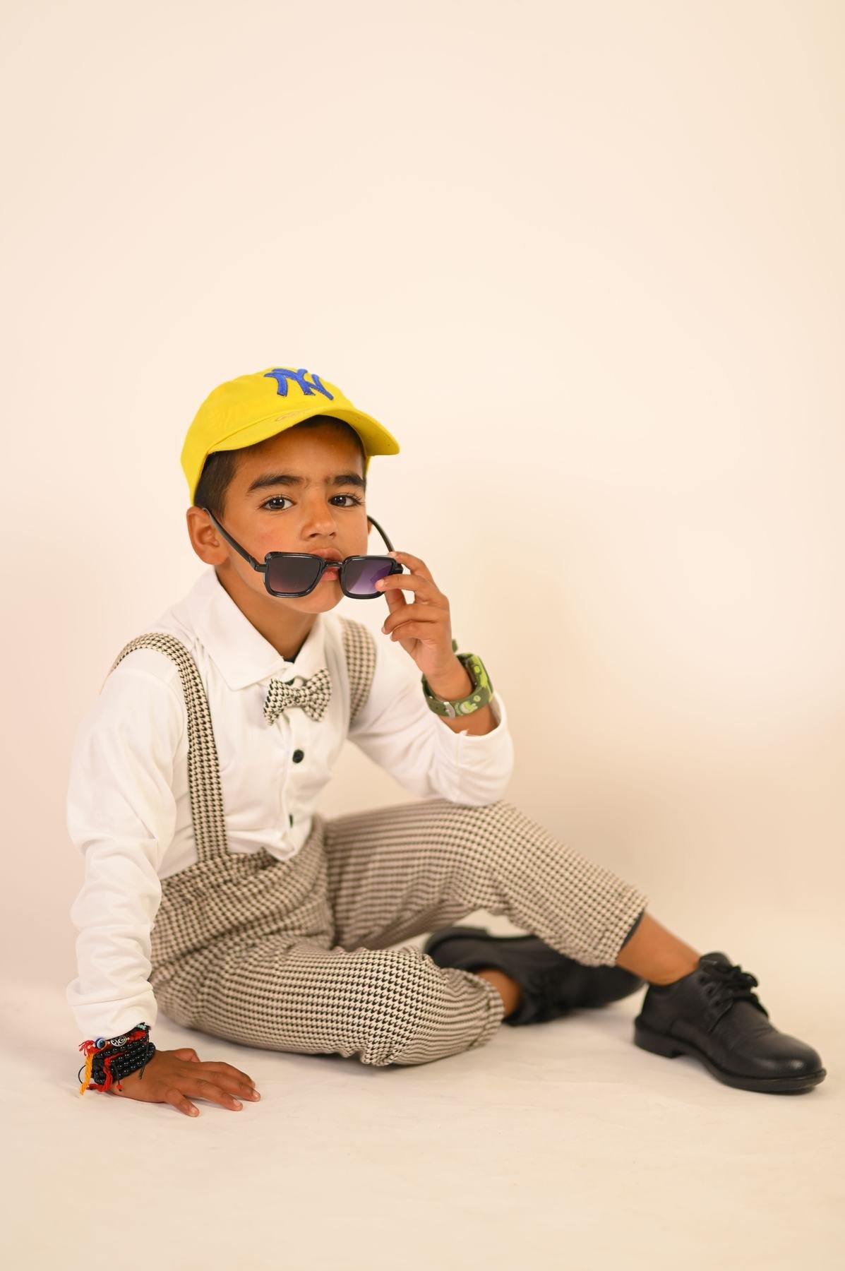 Child dressed in a tailored formal outfit