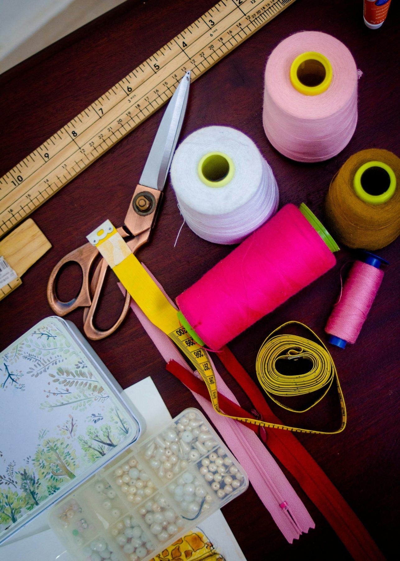 Sewing tools laid over folded fabric